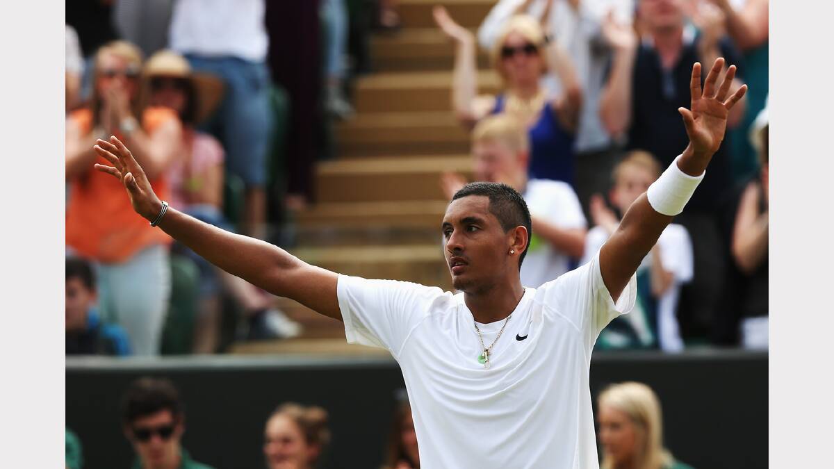 Australia's Nick Kyrgios celebrates victory in his second round match against Richard Gasquet of France. Photo: Getty Images
