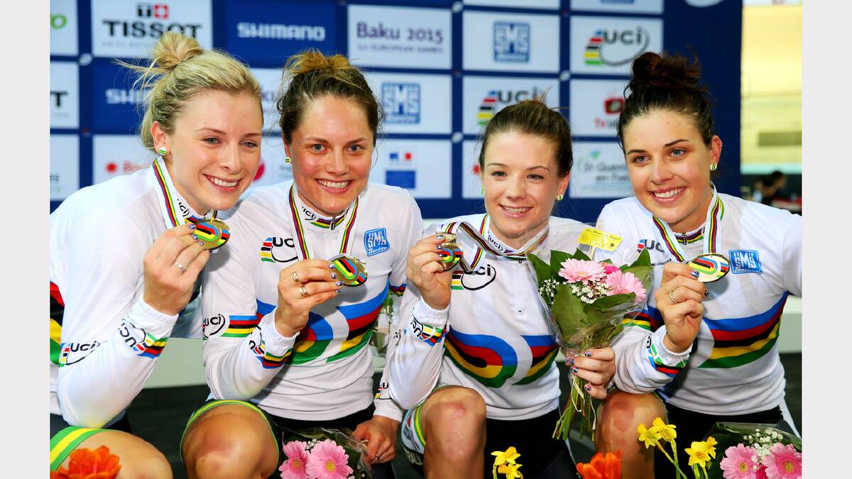 The Australian team of Annette Edmondson, Ashlee Ankudinoff, Amy Cure and Melissa Hoskins celebrate with the gold medals won in the Women's Team Pursuit Final during day two of the UCI Track Cycling World Championships at the National Velodrome in Paris, France. (Photo by Alex Livesey/Getty Images)