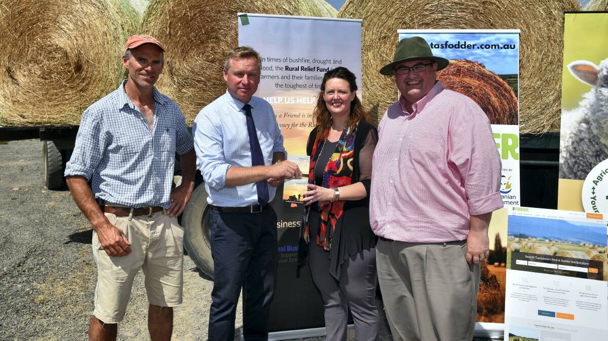 Brian Lawrence, of  Janefield at Meander, Primary Industries Minister Jeremy Rockliff, Rural Business Tasmania chief executive Elizabeth Skirving, and Rural Alive & Well chief executive Danial Rochford welcome the financial assistance for struggling farmers. Picture: PAUL SCAMBLER  