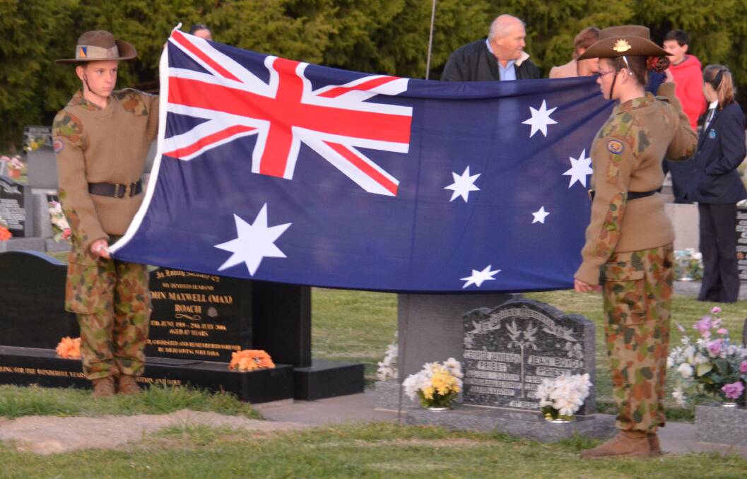 Glen Innes Cadets participate in the unveiling of the graves at the Glen Innes Lawn Cemetery as part of a unique Glen Innes tradition.