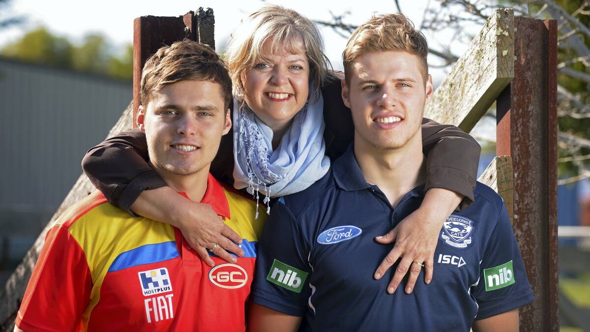 Kade and Jake Kolodjashnij with  their mum Sharon at their home near Longford.   Picture: PHILLIP BIGGS