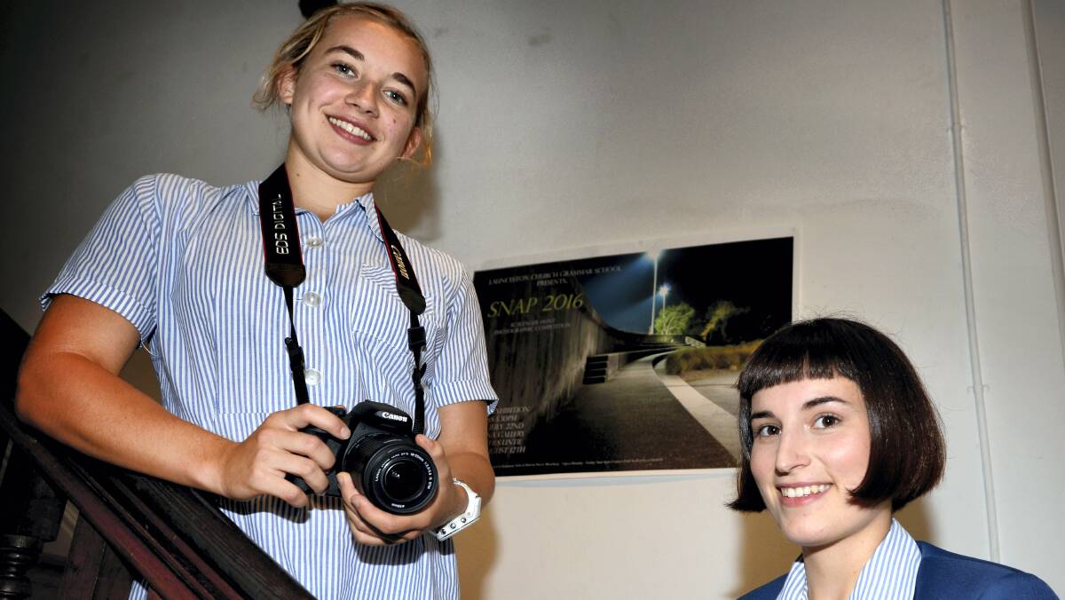 Launceston Church Grammar School art students Lily Leighton and Cat Kerr, both 17, get set for the school’s SNAP photographic competition.  Picture: GEOFF ROBSON