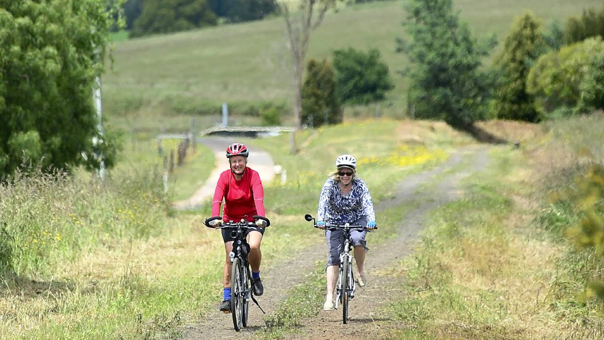 Vicky Cowan and Liz Ling, both of Launceston, try out the new North-East rail trail at Scottsdale at its opening on Sunday. Picture: PHILLIP BIGGS