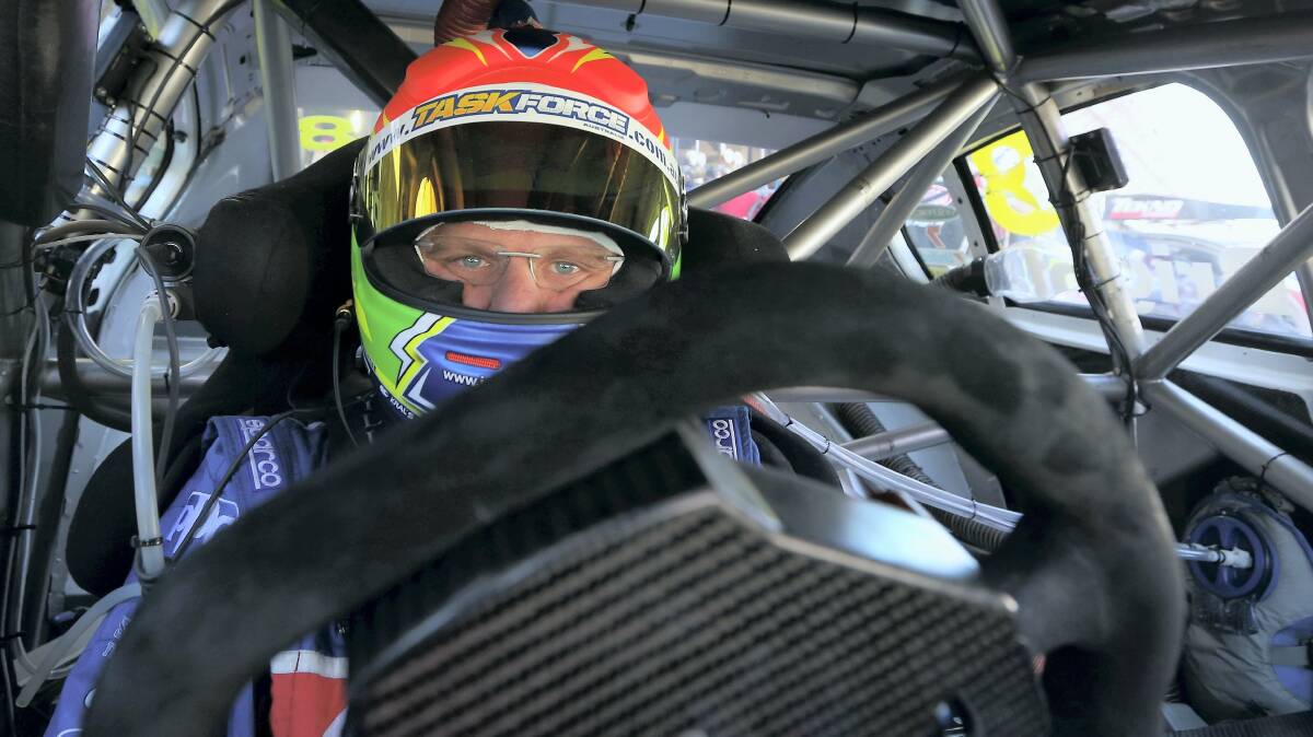 Jason Bright, driver of the Team BOC Holden, sits in his car before qualifying for race three of the V8 Supercars Championships Series at Adelaide Street Circuit this month in South Australia.   Picture: GETTY IMAGES