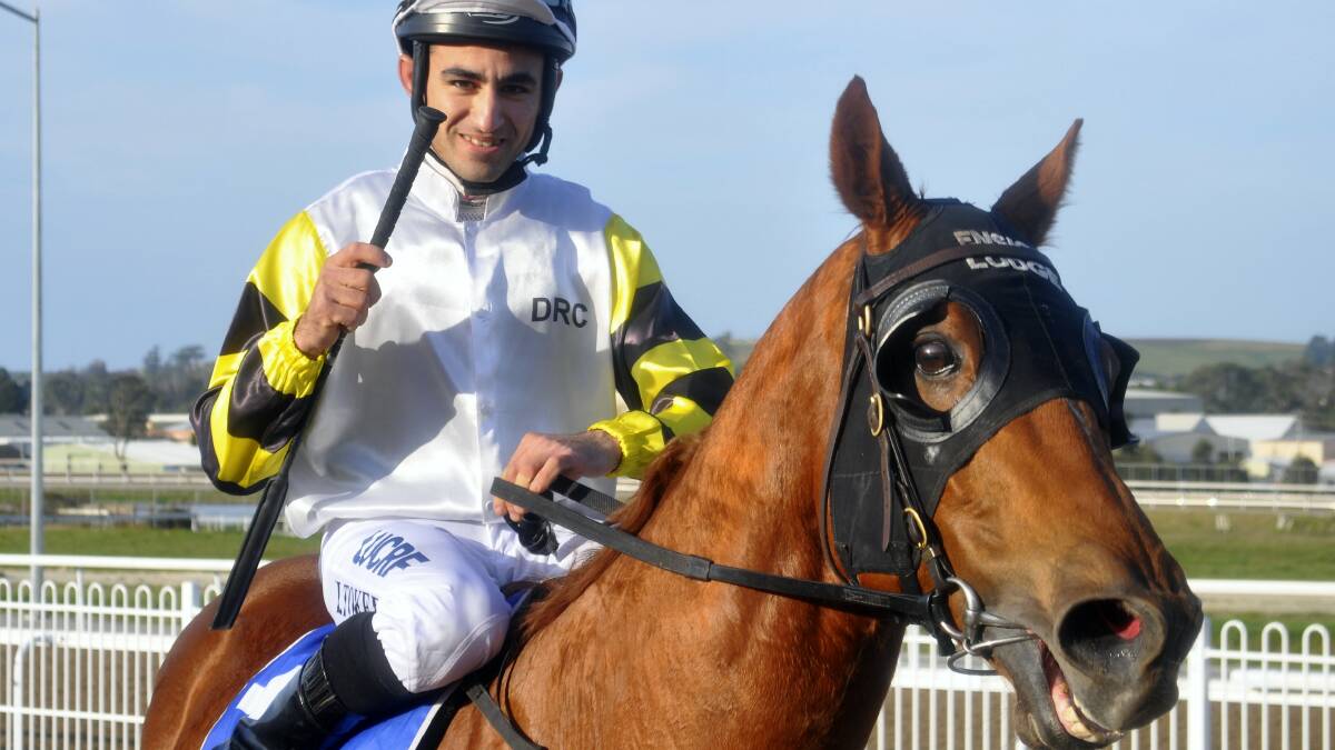 Innocent Gamble and Ismail Toker after one of their four successive wins at Spreyton last year. Picture: GREG MANSFIELD