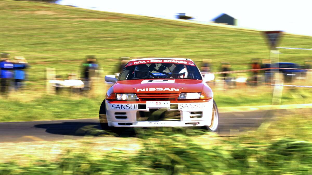 Dave Thompson and Chris Dean slide their Nissan R32 GTR sideways along Valley Field Road on the Moriarty stage during Targa Tasmania.
 Picture: SCOTT GELSTON