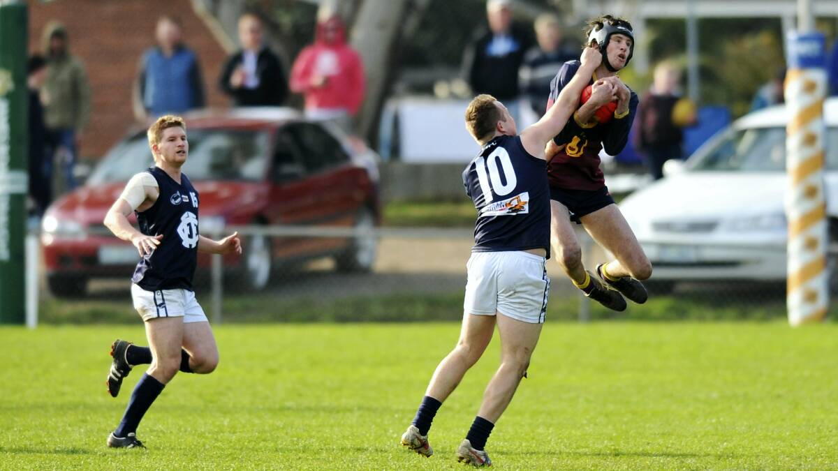 Action from last year's NTFA division 2 grand final where Old Scotch defeated Fingal in a heated clash. 