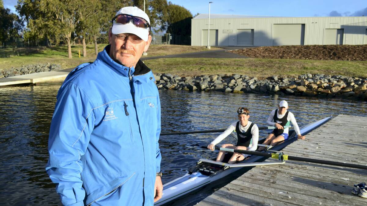 Tasmanian Institute of Sport head coach Brett Crow with non-Olympic lightweight pair Ali Foot and Darryn Purcell.