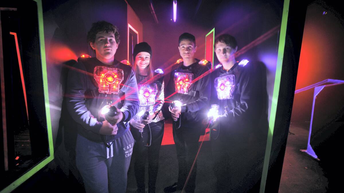 Joeby Neil, Madeline Frankcombe, Laserforce Launceston manager Jordan Gibson and Jaymes Ruffin gear up for the opening of the new laser tag arena at the Launceston Indoor Sports Arena.  Picture: SCOTT GELSTON