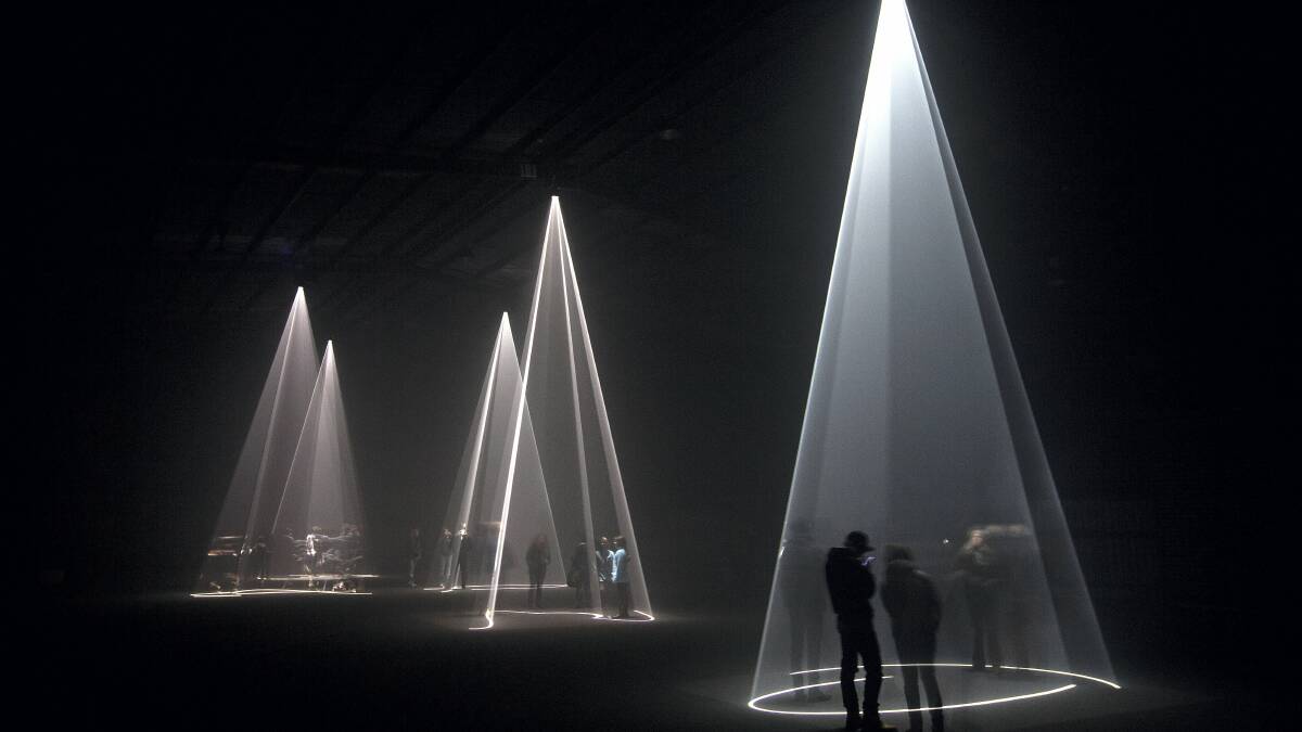 Anthony McCall’s Solid Light Works is one of several light-based installations that have set up in unused warehouses at Macquarie Point as part of Dark Mofo’s festival hub Dark Park. Picture: MONA/REMI CHAUVIN