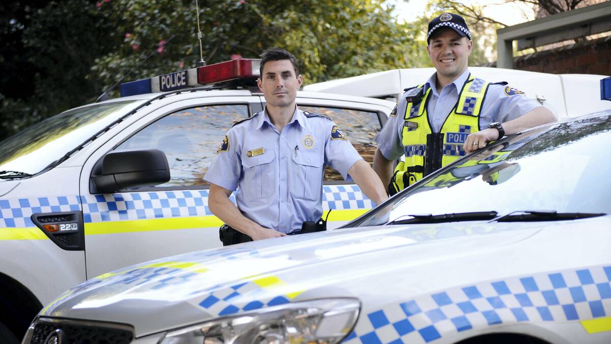 Constable Aaron Hart and Senior Constable Stuart Greenwood are among the Northern police officers keeping an eye on the road on Fatality Free Friday today. Picture: SCOTT GELSTON