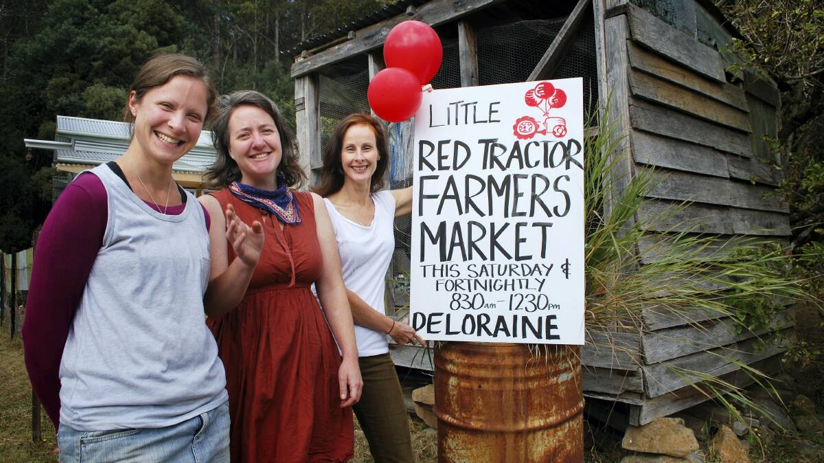 Little Red Tractor Farmers Market baristas Jade Hallam and Hilary Green with market co-ordinator Carolyn Edgecombe. Picture: JAMES BRADY