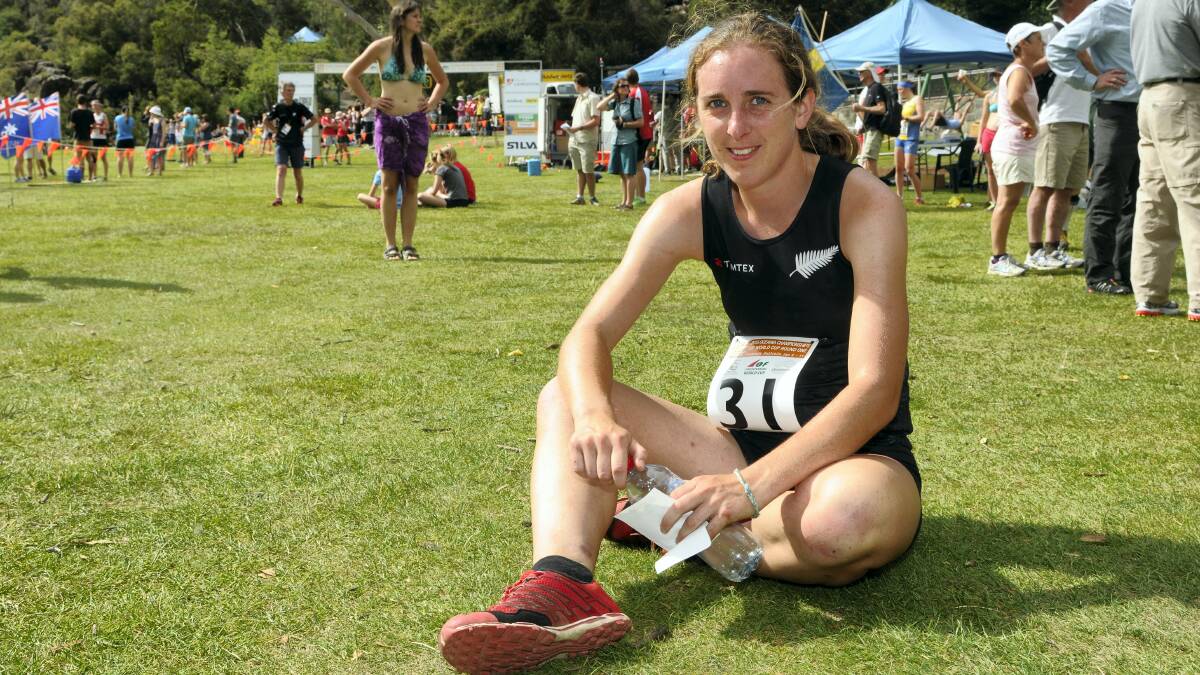 Lizzie Ingham, of New Zealand, takes a break during round one of the 2015 Oceania Orienteering Championships. Picture: PAUL SCAMBLER