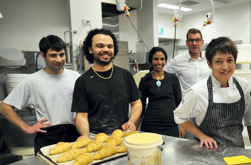 The Manubread team at the bakery at Invermay are Sam Renaud, Gregory Noemie, Archana Brammall, David Bell, and Harlee Triffitt.