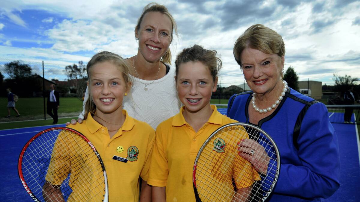 Exeter Primary School pupils Taylor Edmunds and Lucy Cooper with Aussie tennis ace Alicia Molik and Irene Smith, who donated money for the school's new tennis court.  Picture: GEOFF ROBSON
