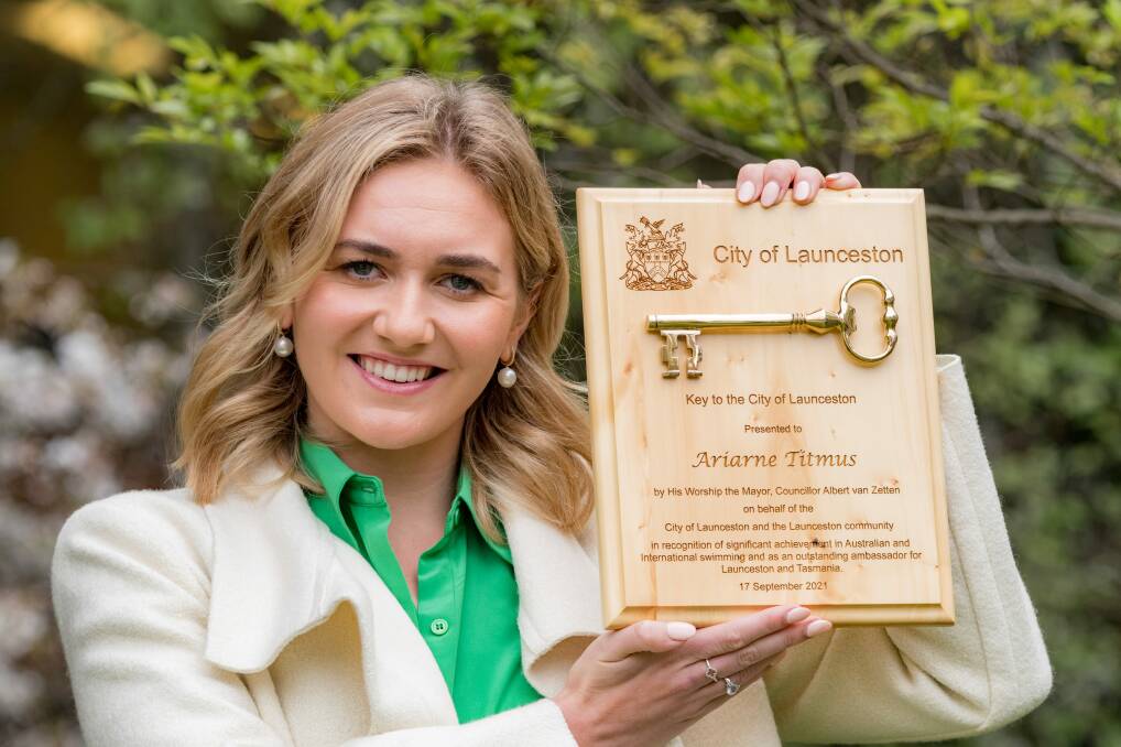 LOCKED IN: Dual Olympic champion Ariarne Titmus receives a key to the city of Launceston. Picture: Phillip Biggs