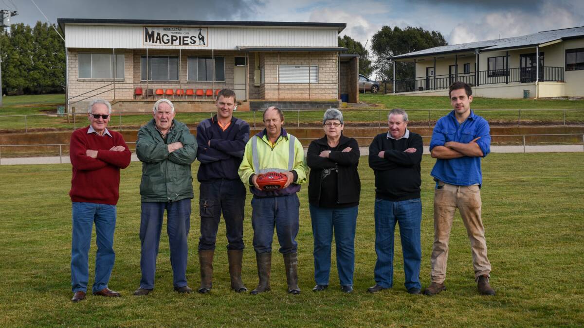 Magpies take flight: Winnaleah Football Club stalwarts Trevor Lester, Arthur Taylor, Kirk Wagner, Frank Wagner, Donna Wagner, Ronnie Fenton and Jackson Shaw at the club in June last year. Picture: Paul Scambler.