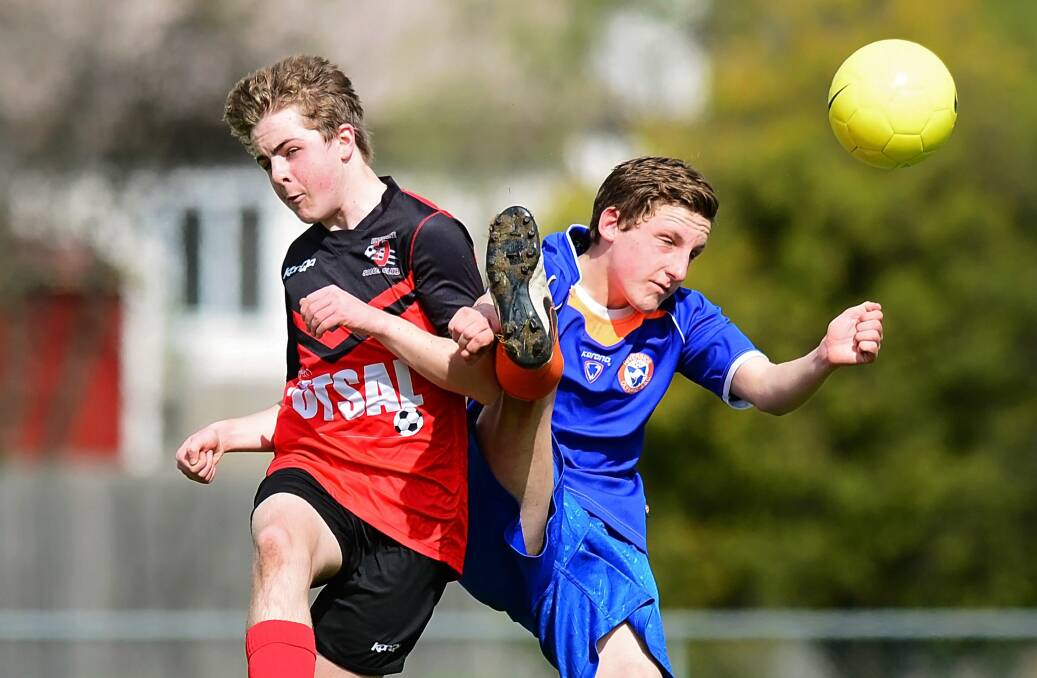 Riverside's Ethan Taylor gets a leg-up against Ulverstone.