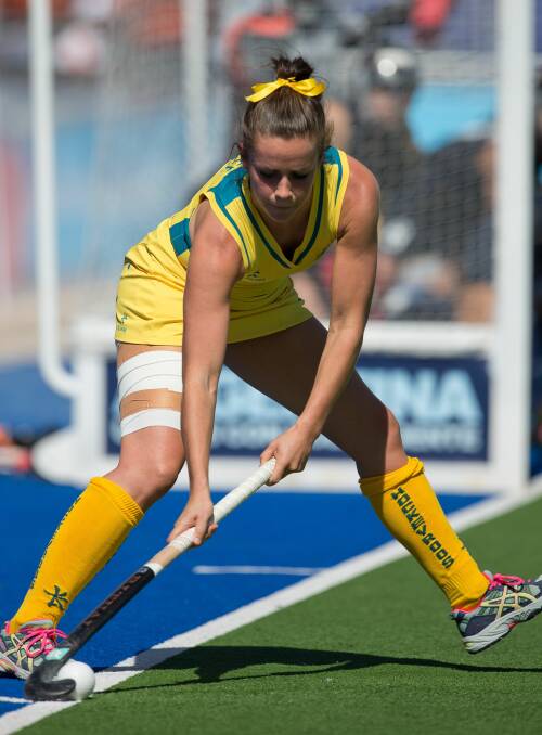 Turning a corner: Amelia Spence, pictured playing for the Hockeyroos in 2014, is again seeking national selection.