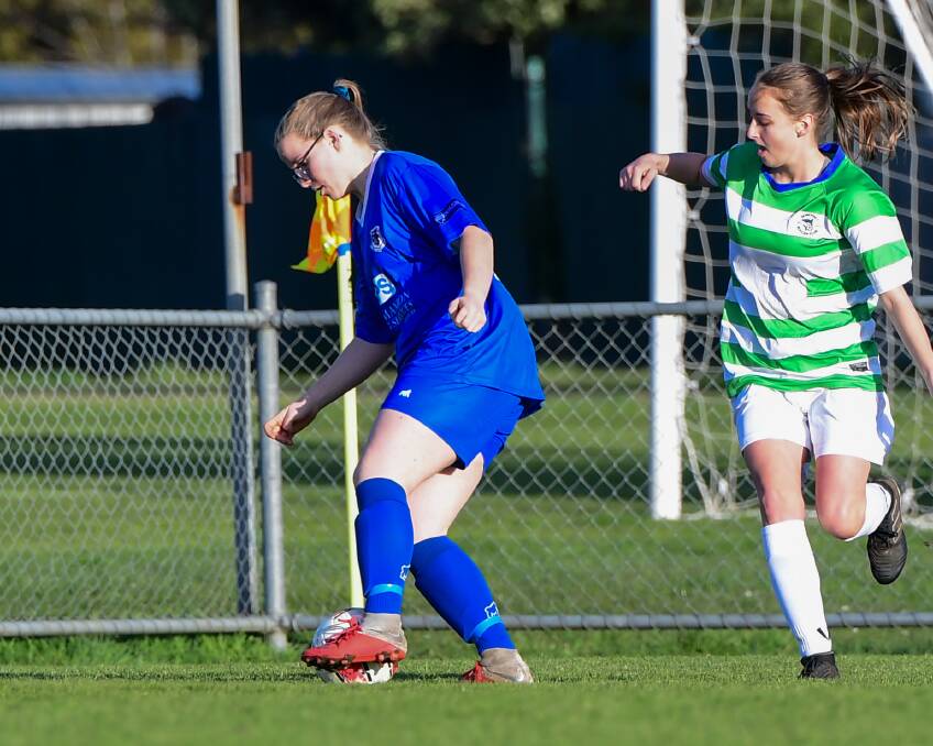 SHIELDING THE BALL: Annika Reitsema in possession for Launceston United against Somerset. Picture: Neil Richagrdson