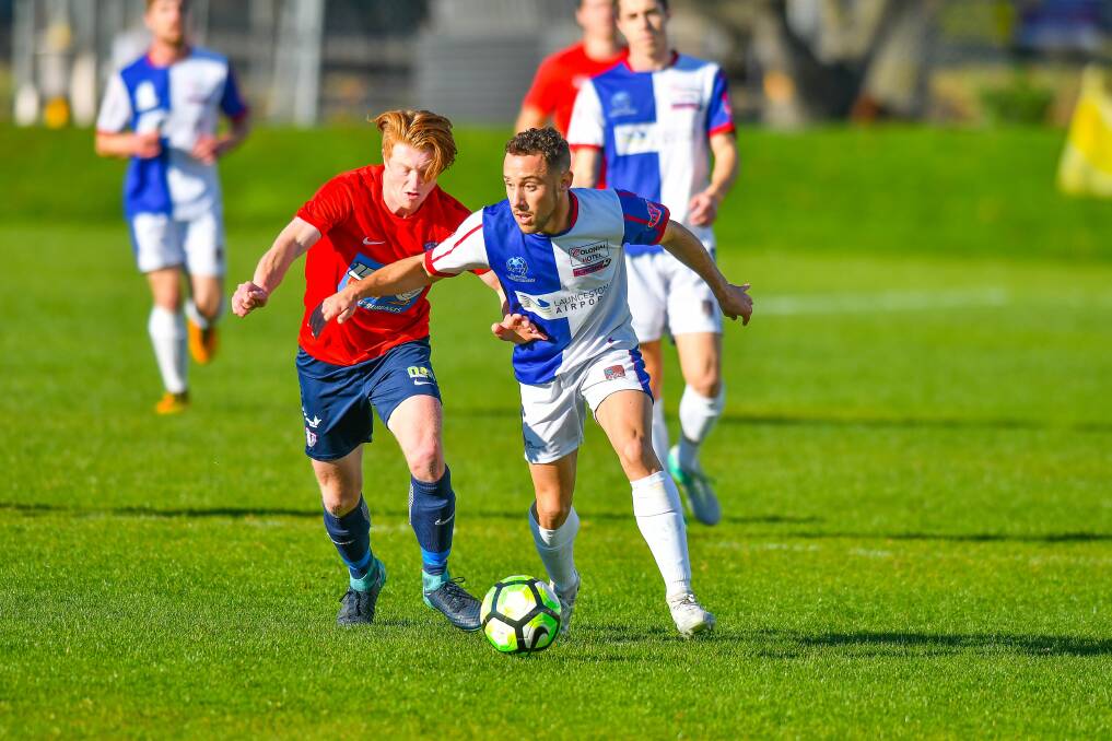 Cup drawn: Northern Rangers striker Federico Cano takes on South Hobart's Adam Gorrie on Sunday. Both teams also feature in Saturday's Lakoseljac Cup semi-finals.