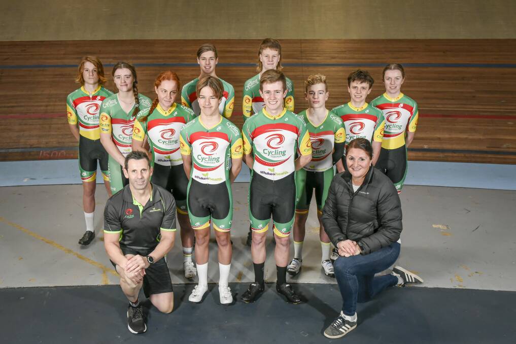 Ready to roll: The Tasmanian junior track cycling team with manager Stephen Stone and coach Janelle Smith. Picture: Craig George
