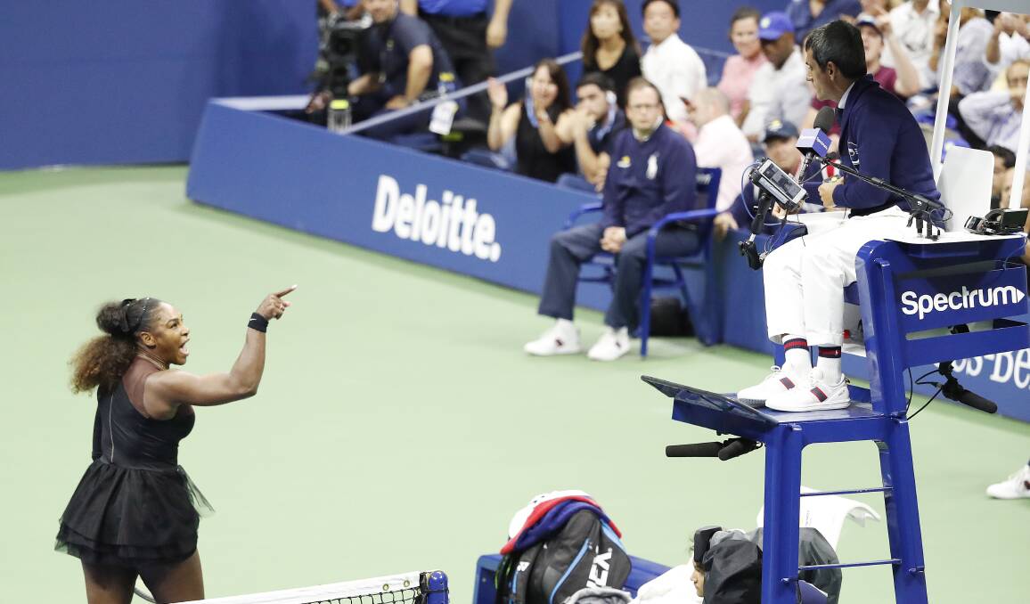 Making a point: Serena Williams indicates to chair umpire Carlos Ramos who deserves the apology during the US Open women's final in Flushing Meadows, New York. Picture: EPA
