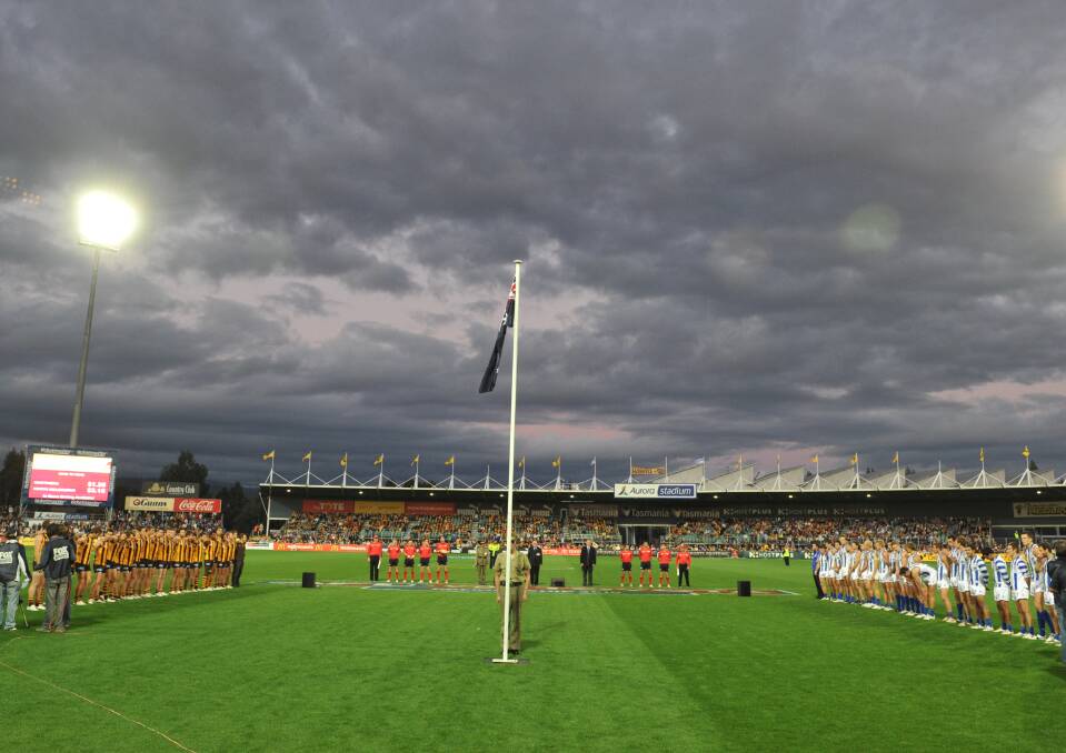 Flag favourites: Hawthorn and North Melbourne commemorate Anzac Day in Launceston in 2010.