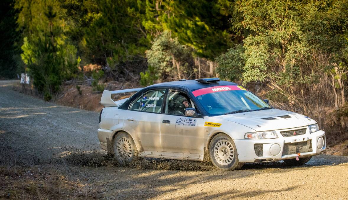 Skid row: Steve Maguire and navigator Stuart Benson on their way to victory in the Rocky Cape Sprint Rally in their Mitsubishi Lancer Evo 5.