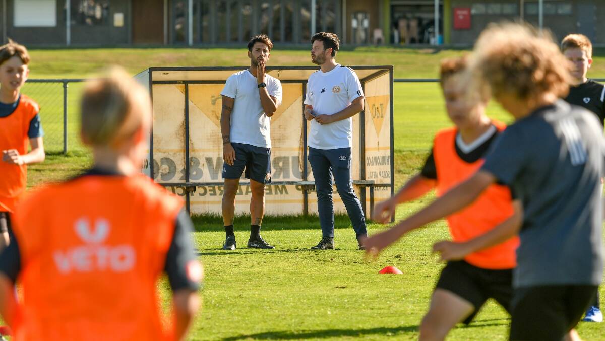 Kicked out: Player Luca Vigilante and coach Alex Gaetani oversee Riverside Olympic training at Windsor Park back in February. Picture: Scott Gelston