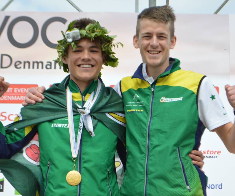 Great Dane: Aston Key celebrates his gold medal with team coach Brodie Nankervis in Denmark.