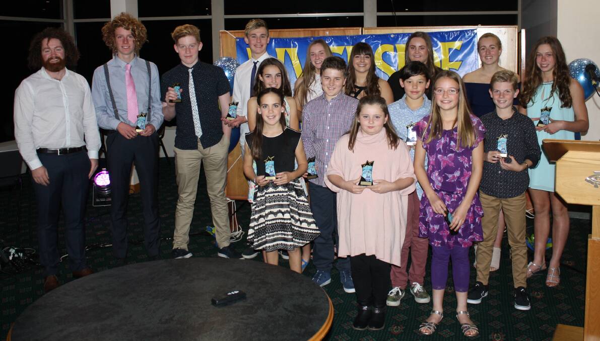 Lapping it up: Riverside Aquatic coach Matt Barwick and award winners at the club's annual dinner. Picture: Ted Cooper