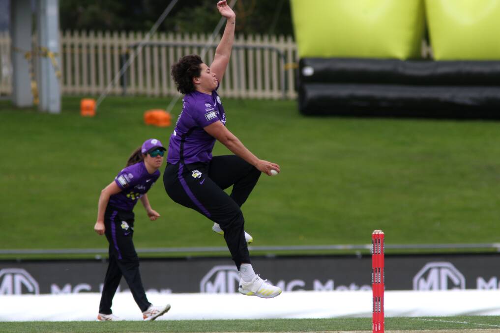 Belinda Vakarewa bowling for the Hurricanes against Melbourne Stars at Bellerive Oval. 