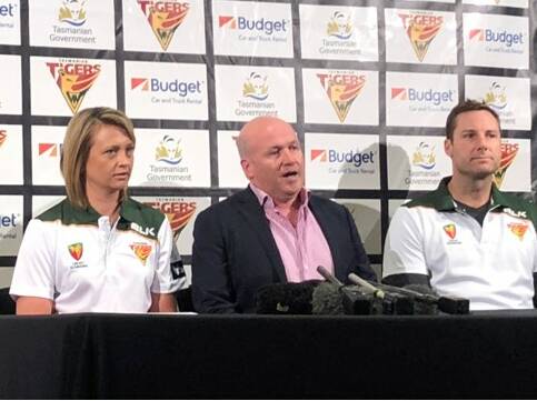 Cricket Tasmania's new women’s team head coach Salliann Briggs, chief executive Nick Cummins amd men's team head coach Adam Griffith announce the joint Tigers branding.