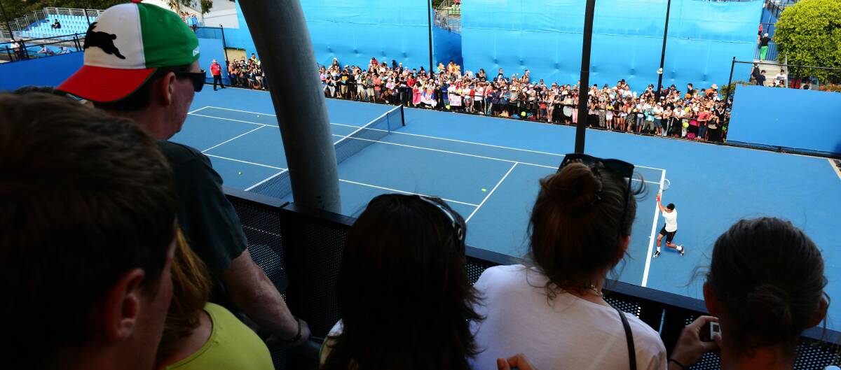 Open season: Novak Djokovic practises social distancing at the 2014 Australian Open.