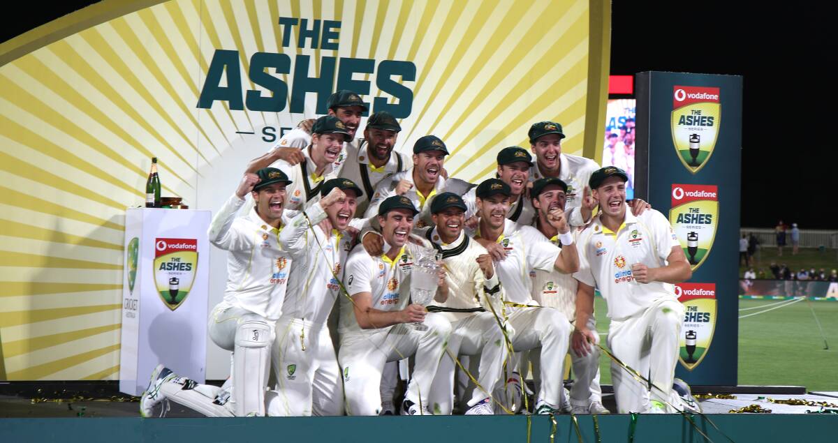 Stumped: Australian players celebrate after completing a 4-0 Ashes scoreline in Hobart. Pictures: Rick Smith