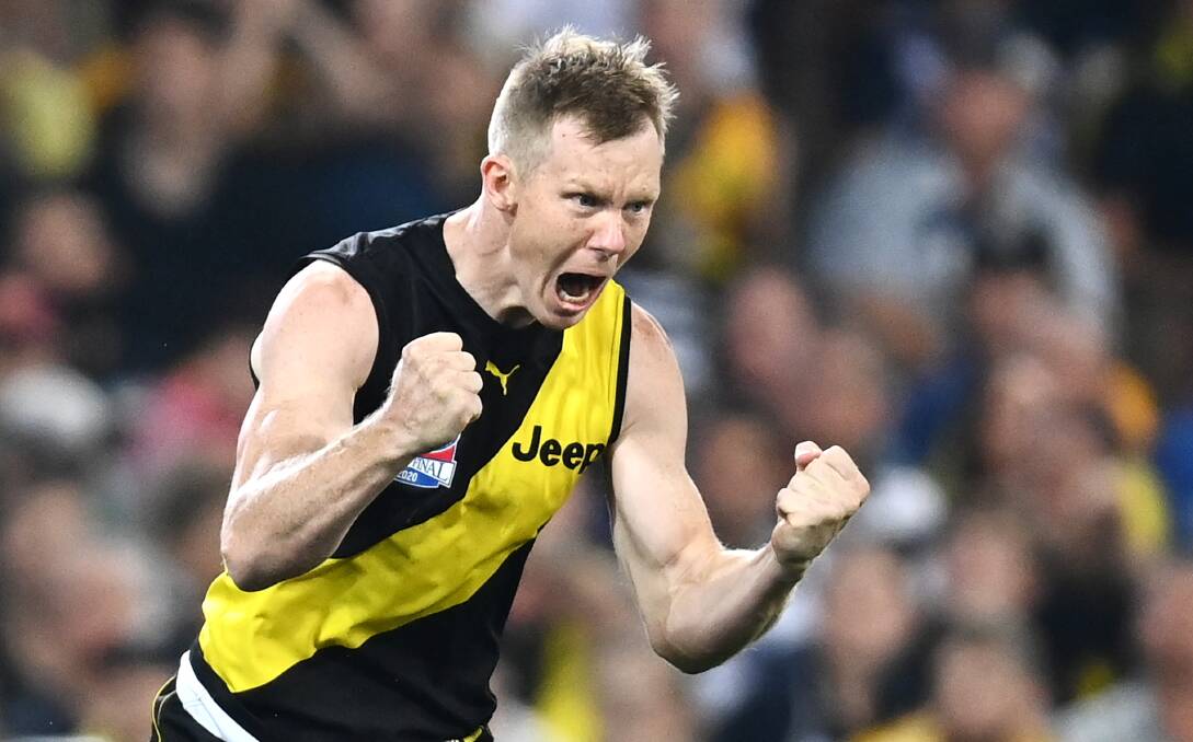 HUNTED TIGER: Richmond forward Jack Riewoldt celebrates the news that Brian Taylor would not be doing a roving report after Saturday's AFL grand final. Picture: Getty Images