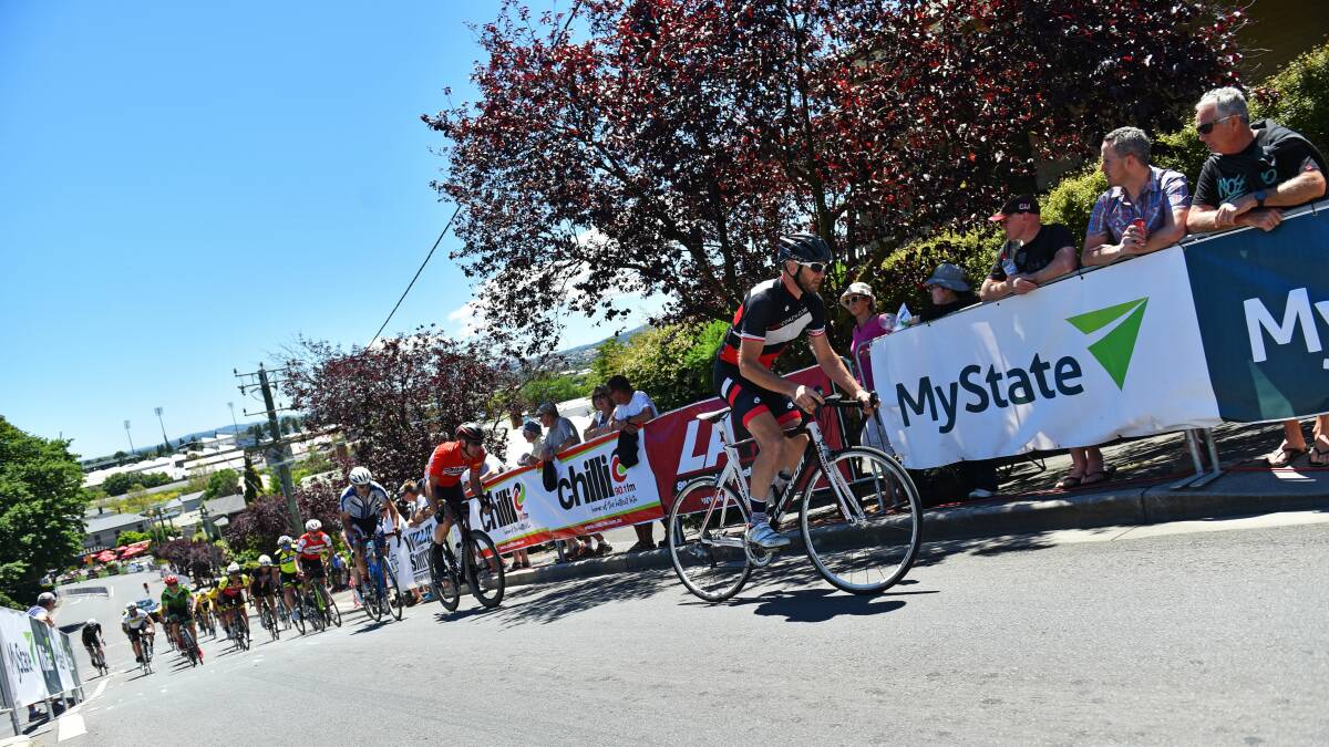Over the hill: Nelson Clark summits the Lawrence Street climb in the 2016 masters race.