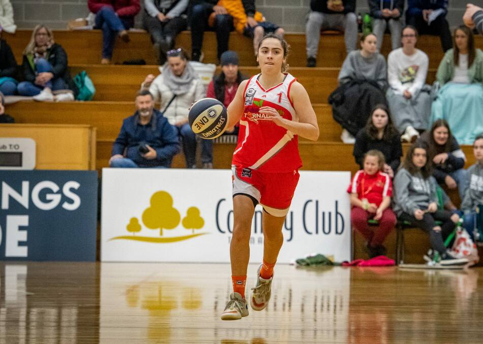 AIMING HIGH: Tornadoes player Aishah Anis is among the Tasmanians on sport scholarships in the US.