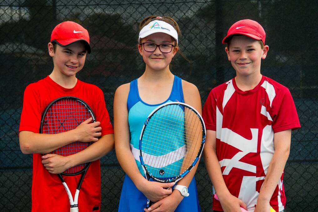 Jake Elmer, Arwen Koesmapahlawan and Alex Martin are part of the Tasmanian state tennis team going to nationals. Picture: Scott Gelston. 