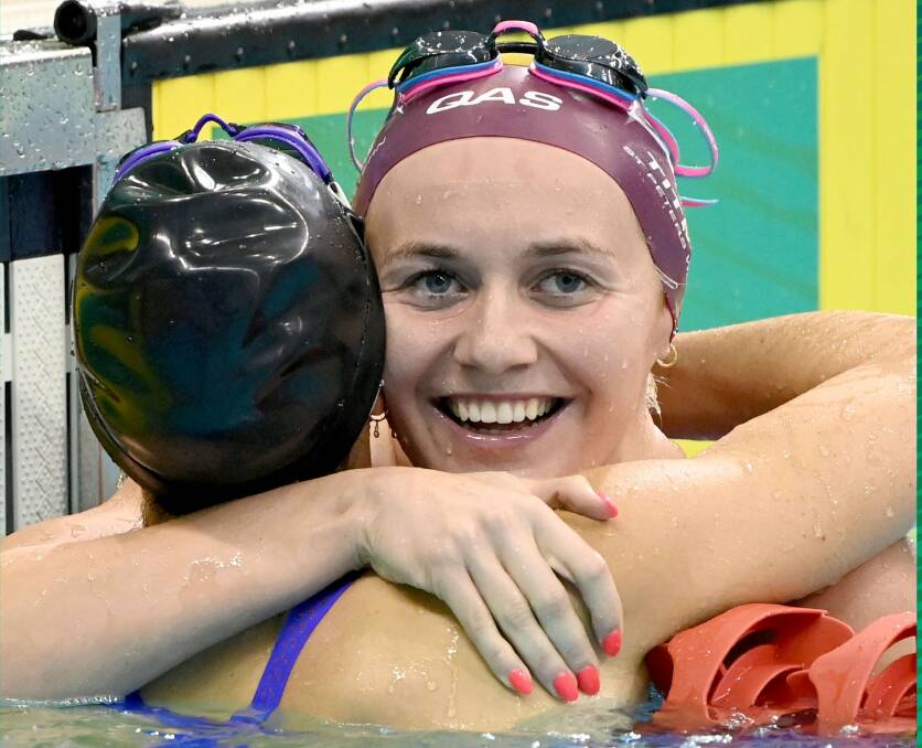 Golden grin: Ariarne Titmus celebrates her win. Picture: Swimming Australia