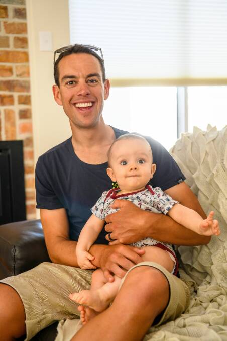 Richie Porte and son Luca at home in Launceston last year.