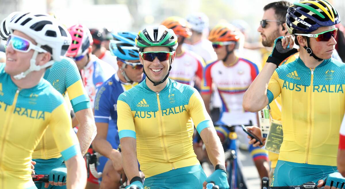 Take me to your leader: Richie Porte (centre) with Australian teammates Rohan Dennis and Scott Bowden in the Olympic road race in Rio de Janeiro. Pictures: Getty Images