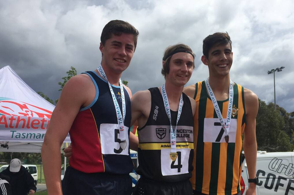 Play it again: Sam Clifford (Launceston College) wins the under-18 1500m from Jamie Lawrence (Guilford Young) and Ethan Stretton (St Pat's). Picture: Rob Shaw
