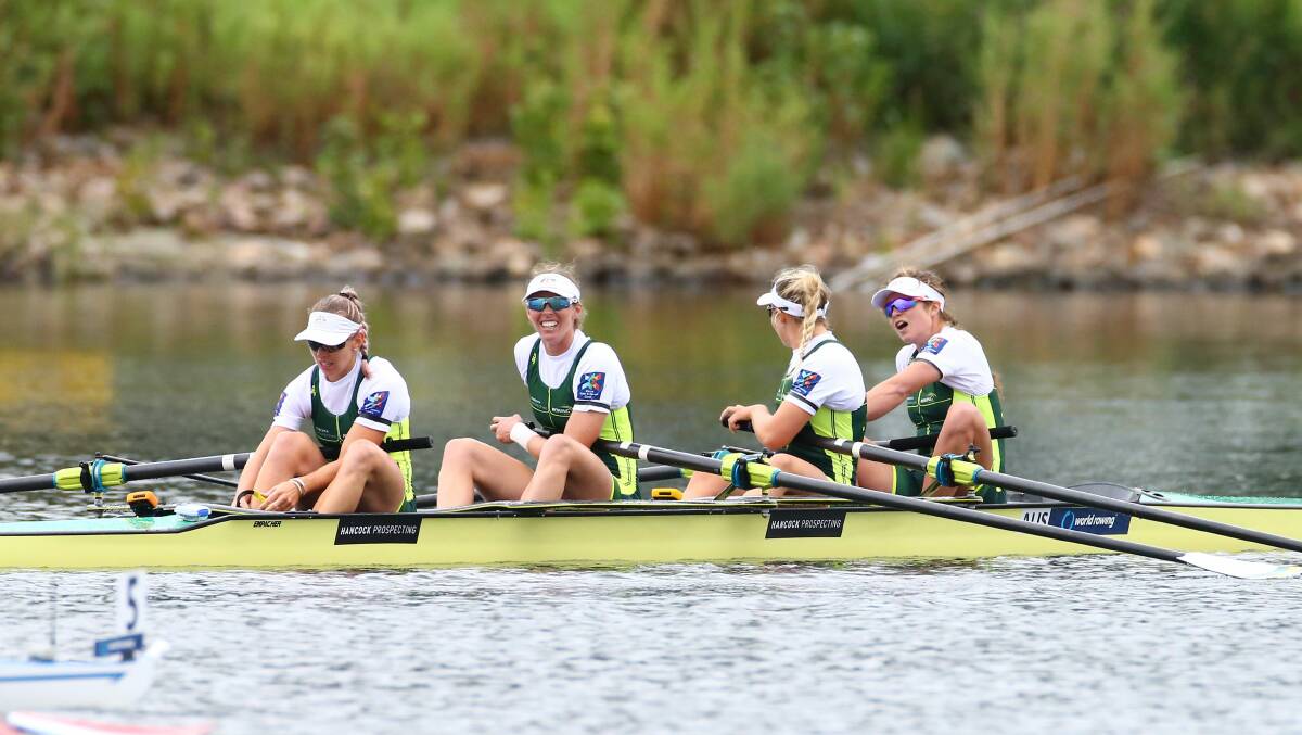 Smiley face: A beaming Sarah Hawe (second from left) celebrates her crew's victory. Picture: Rowing Australia