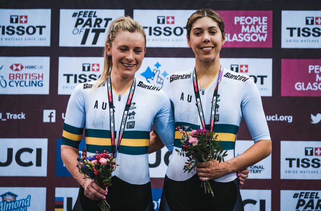 Mad for it: Annette Edmondson and Georgia Baker celebrate their win in Glasgow. Picture: Cycling Australia