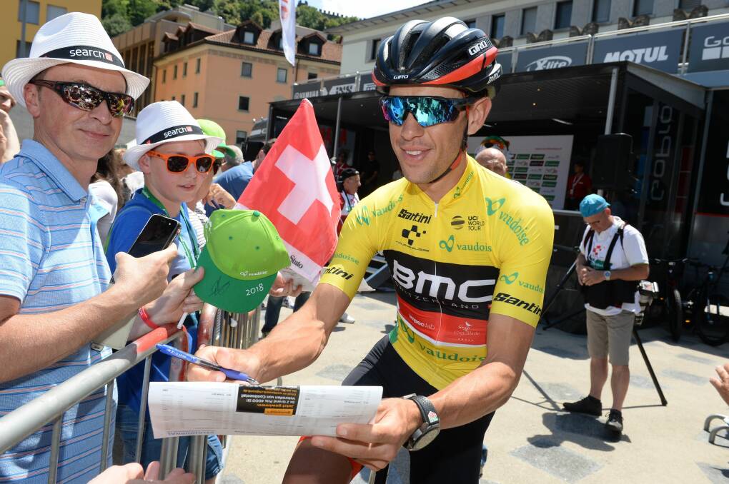 Yellow fever: Race leader Richie Porte is busy signing autographs at the Tour de Suisse. Picture: BMC Racing Team