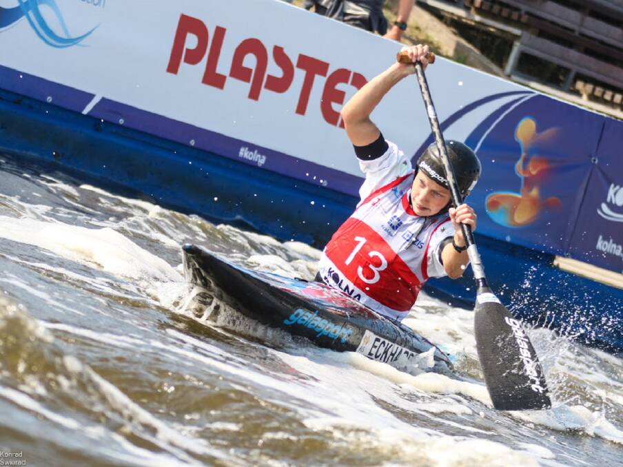 Smokin' on the water: Tasmanian Kate Eckhardt tackling the course in Poland. Picture: Konrad Wierad