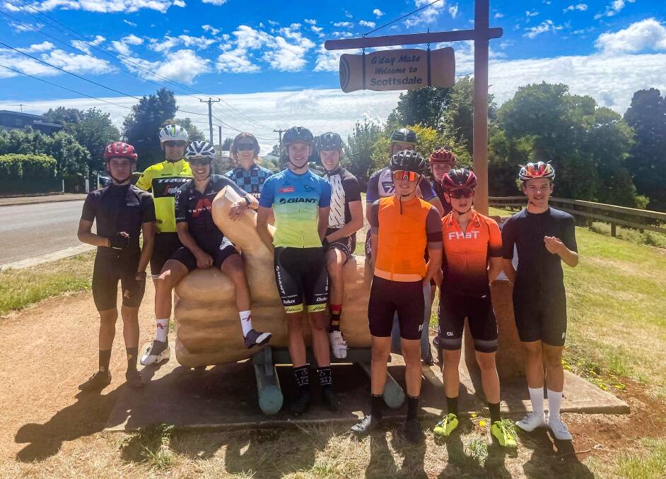 THUMBS UP: Richie Porte pauses with a crop of young Tasmanian riders during a ride to Scottsdale. Picture: James McKee