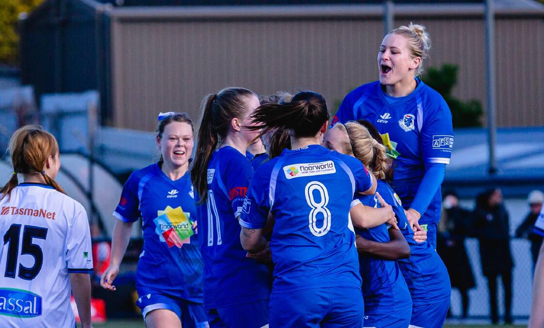 BLUE WAVE: Launceston United players celebrate their opening goal in the Statewide Cup win over Kingborough. Picture: Linda Higginson